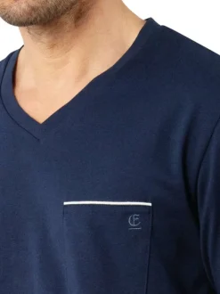 Pyjama court en coton bleu marine à col v avec des minis motifs sur le short