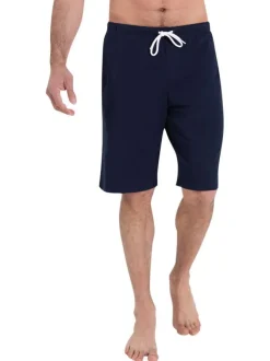 Pyjama court en coton bleu à rayures et à coupe droite avec une poche