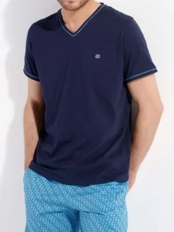 Pyjama court en coton bleu uni coupe fermée avec col v et poches latérales