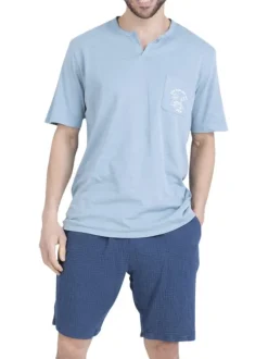 Pyjama court en coton bleu uni pourvu d'une coupe droite et d'un col tunisien