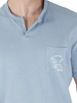 Pyjama court en coton bleu uni pourvu d'une coupe droite et d'un col tunisien