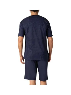 Pyjama court en coton marine à pois avec une coupe fermée et un col en V