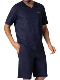 Pyjama court en coton marine à pois avec une coupe fermée et un col en V