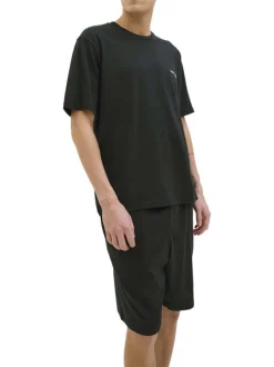 Pyjama Court en coton noir uni avec une coupe fermée et un col rond