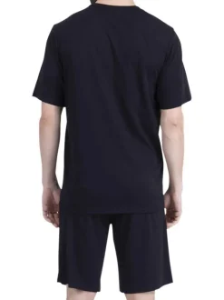 Pyjama court en coton noir uni pourvu d'un col rond et d'une coupe droite