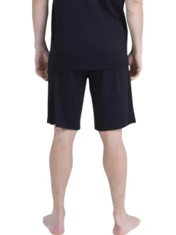 Pyjama court en coton noir uni pourvu d'un col rond et d'une coupe droite