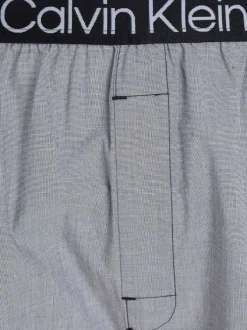 Pyjama long bleu et gris uni à manches longues avec une coupe droite