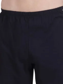 Pyjama long en coton bleu uni pourvu d'une coupe droite et d'un col rond