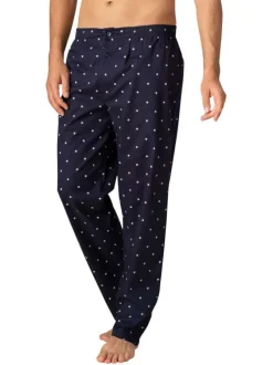 Pyjama long en coton marine à pois avec une coupe ouverte et un col cranté