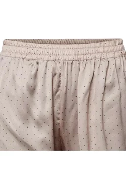 Pyjama long rose pâle à pois à col cranté taille élastiquée et coupe droite fluide