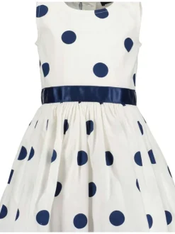 Robe courte en coton blanche à pois avec une coupe droite et un col rond