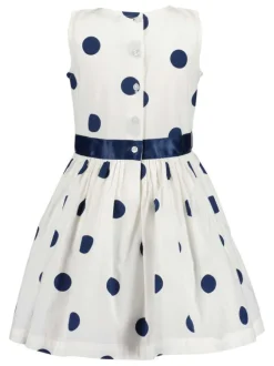 Robe courte en coton blanche à pois avec une coupe droite et un col rond