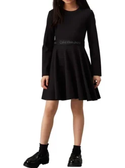 Robe courte noire unie à coupe patineuse et à manches longues