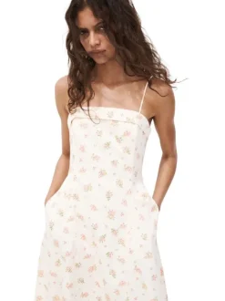 Robe courte en coton beige à motifs pourvue d'une coupe évasée