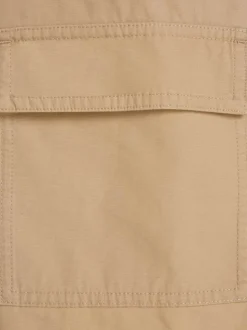 Robe courte en coton biologique beige unie coupe cintrée col v