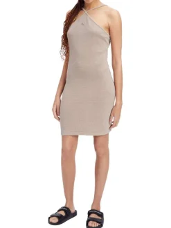 Robe courte à fines bretelles en coton beige unie avec un col ras du cou croisé