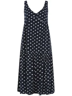 Robe courte marine à pois avec manches à bretelles réglables par un noeud