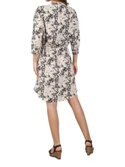 Robe courte multicolore imprimé feuille all-over coupe asymétrique avec un col v et un lien à nouer à l'avant