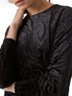 Robe courte noire en velours coupe près du corps col rond et à manches longues