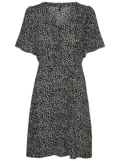 Robe courte noire à pois blancs boutonnée à coupe droite fluide et à col v