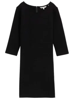 Robe courte noire unie avec un col rond et des manches longues