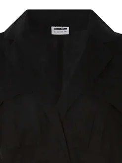 Robe courte noire unie à coupe droite fluide et à col v à revers avec pression