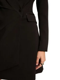 Robe courte noire unie pourvue d'un col v et de manches longues