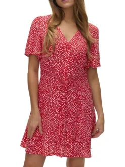 Robe courte rouge ornée d'un motif à pois et pourvu d'un col v