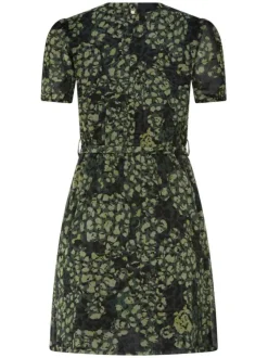 Robe courte verte mouchetée avec une coupe fluide et un col V