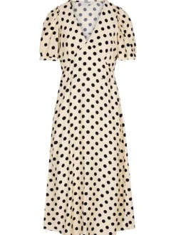 Robe longue beige à motifs pourvue d'une découpe sous la poitrine
