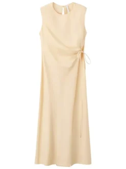 Robe longue beige unie sans manche pourvue d'une coupe évasée
