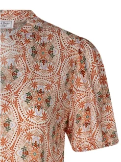 Robe longue écrue florale pourvue d'une coupe large et des manches courtes