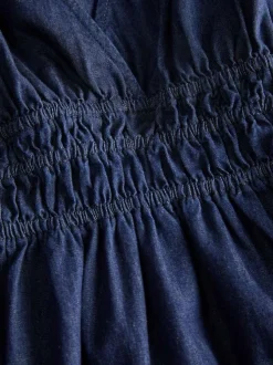 Robe longue en coton bleu foncé pourvue d'une coupe évasée et d'un col v