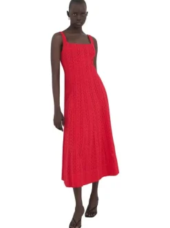 Robe longue en coton rouge unie sans manche pourvue d'une coupe évasée