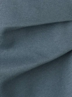 Robe longue en lin gris clair unie pourvue d'une coupe ajustée et d'un col rond