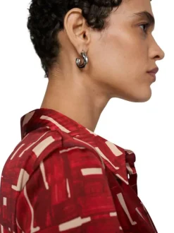 Robe longue rouge imprimée à coupe évasée avec col à revers et manches longues