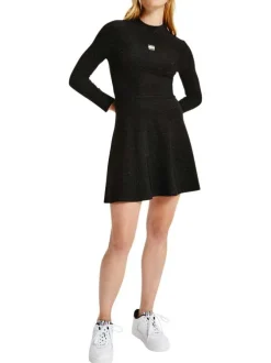 Robe patineuse noire pailleté coupe courte à col montant et manches longues