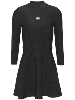 Robe patineuse noire pailleté coupe courte à col montant et manches longues