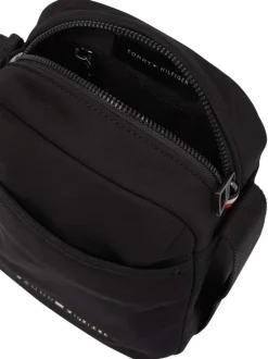 Sac sacoche noir uni avec nom iconique sur le devant et zip de fermeture