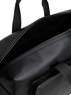 Sac weekender noir aspect grainé pourvu d'une bandoulière amovible