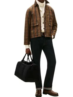 Sac weekender noir en maille lisse pourvu d'une bandoulière plate