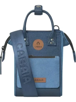 Sac à bandoulière bleu uni avec des patchs au nom de la marque