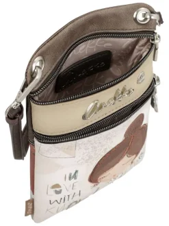 Sac bandoulière écru imprimé avec un logo métallique de la marque à l'avant