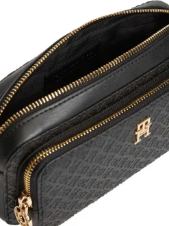 Sac à bandoulière noir pourvu d'une bandoulière amovible et de détails dorés