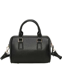 Sac bowling porté main noir uni pourvu d'une bandoulière plate réglable