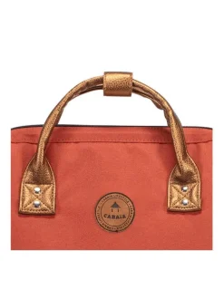 Sac à dos brique pour femme avec une poche centrale zippée et des hanses en cuir