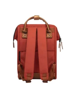 Sac à dos brique pour femme avec une poche centrale zippée et des hanses en cuir