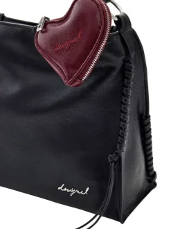 Sac en coton noir uni pourvu d'une anse et une bandoulière