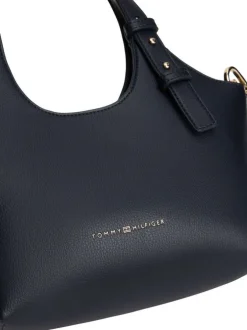 Sac à main marine pourvu d'une bandoulière amovible et du nom de la marque