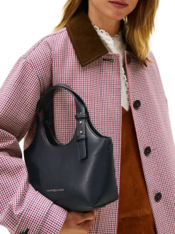 Sac à main marine pourvu d'une bandoulière amovible et du nom de la marque